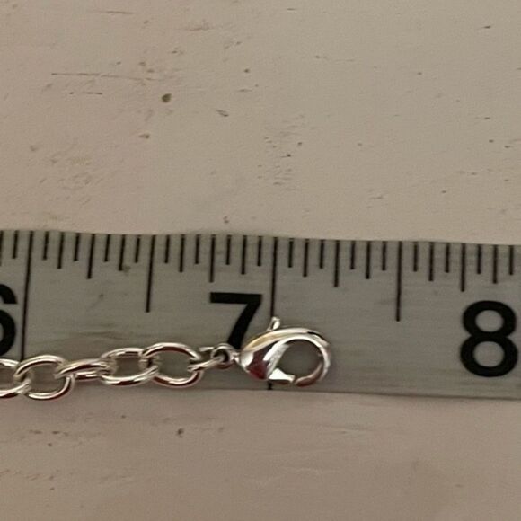 7” silver tone rolo chain bracelet w/0.75” filigree heart w/peridot center - Picture 7 of 9